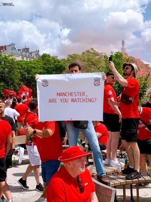 Liverpool fans support City
